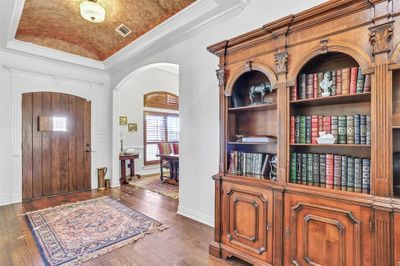 Beautiful wood door and decorative ceiling at entry | Image 3