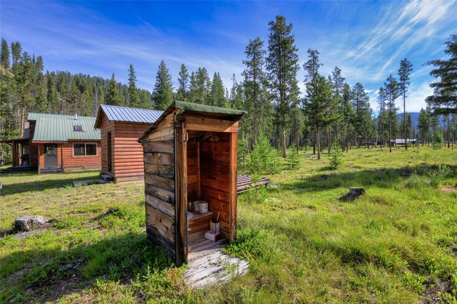View of shed featuring a view of trees | Image 11