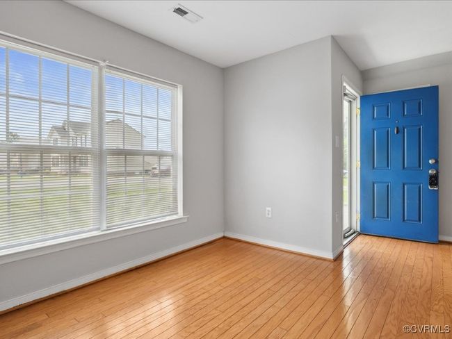 Foyer featuring plenty of natural light and light wood-type flooring | Image 8