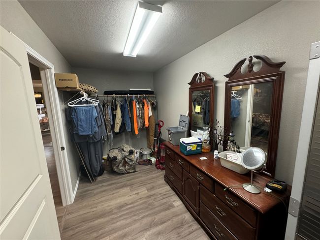 house on slab laundry and closet | Image 26