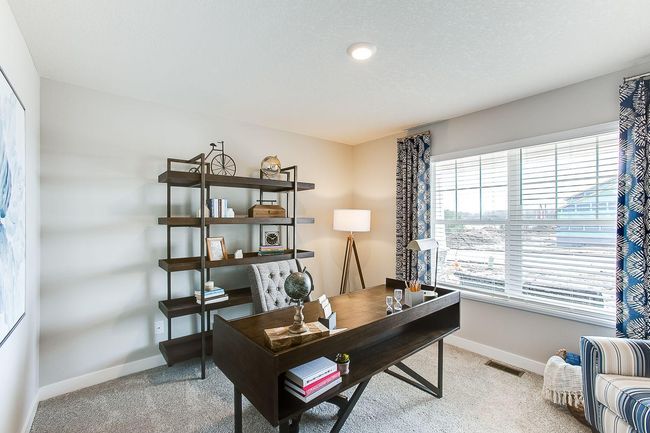 The front flex room on the Finnegan provides options for an at home office, play room, or exercise area! Photos of model home. Colors and options may vary. Ask Sales Agent for details. | Image 13