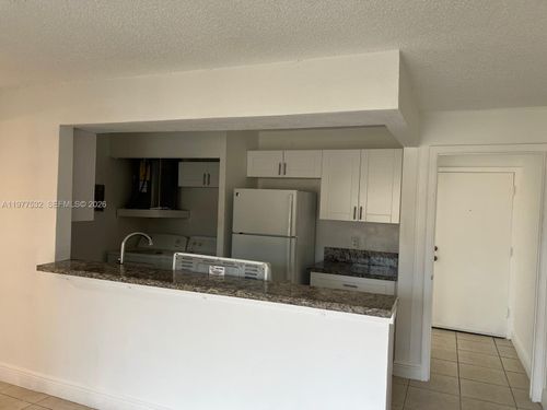 27-h-4435 Treehouse Ln, Tamarac, FL, 33319-3394 | Card Image