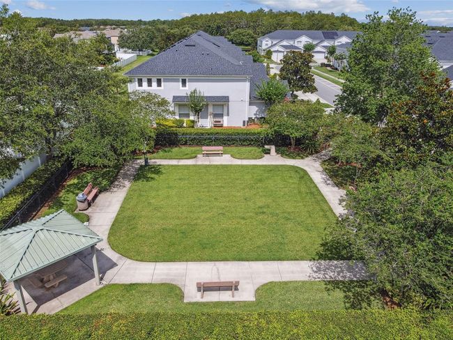 Spring Isle offers resort-style amenities with low HOA fees of only $243/month, which cover the roof, exterior paint, and lawn maintenance—making this a true low-maintenance home. Community amenities include a sparkling pool, playground, dog park, and a fully equipped fitness center. | Image 33