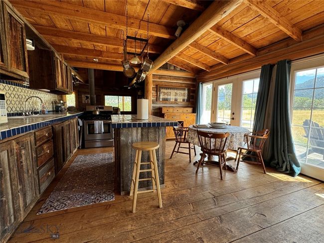 Yellowstone Cabin Kitchen and Dining Area | Image 12