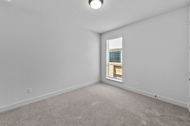 Empty room with carpet floors and baseboards | Image 23