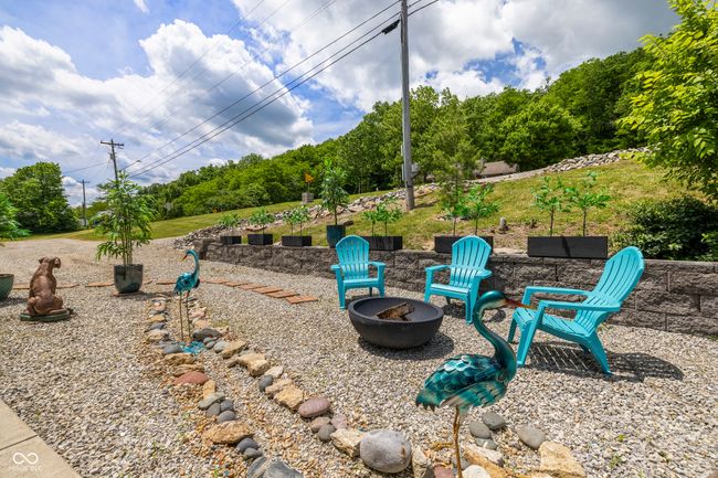 view of yard featuring a fire pit | Image 66