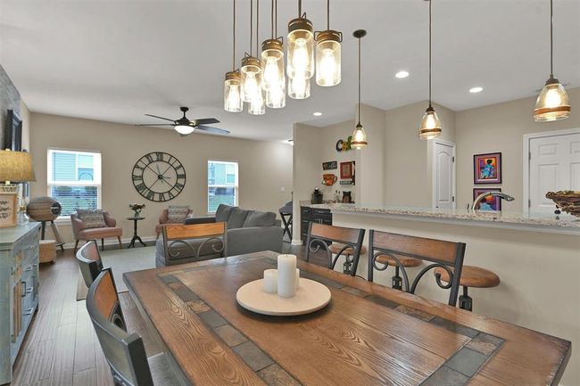KITCHEN, BREAKFAST RM, FAMILY RM, SUN RM - ALL PART OF THE ACTION! | Image 13