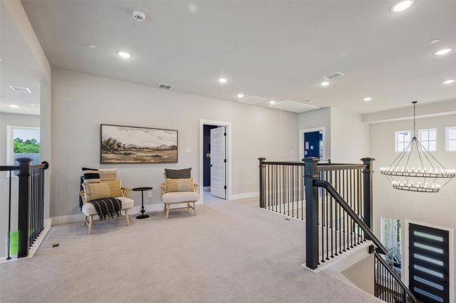 Large Upstairs loft area leads to the 3 upstairs bedrooms. | Image 23