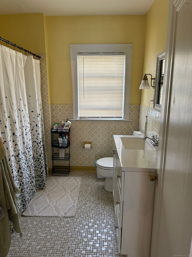 Full size bathroom with tub, shower and newer vanity | Image 14