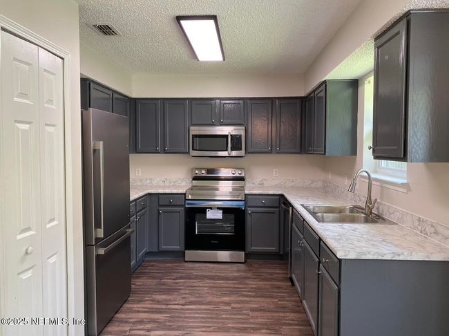 2456 Justin Rd W, House other with 3 bedrooms, 2 bathrooms and null parking in JACKSONVILLE FL | Image 5