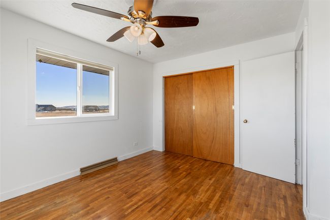 Warm wood flooring for a welcoming touch. | Image 47