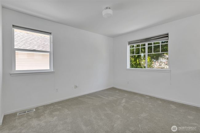 Upper level open loft is perfect for a home office, or it can be enclosed to create a 3rd bedroom | Image 20