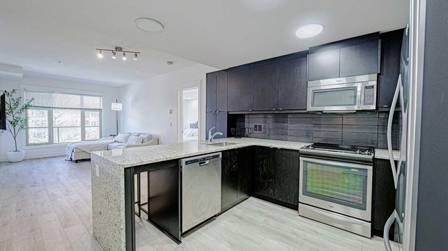 122 - 15 Aspenmont Hts Sw, Condo with 2 bedrooms, 2 bathrooms and 1 parking in Calgary AB | Image 7