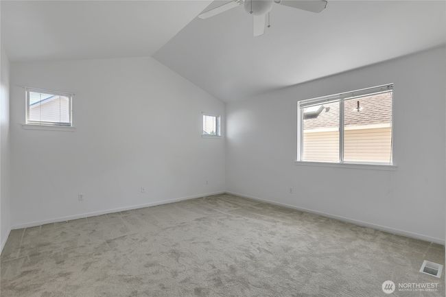 Spacious primary suite with vaulted ceiling | Image 17