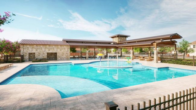 Community pool with fence and a patio area | Image 21