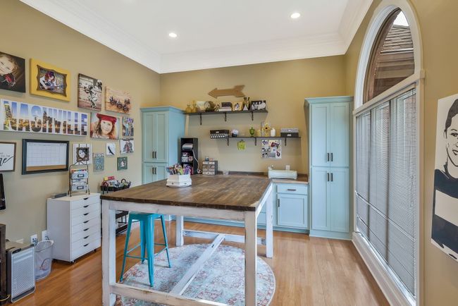 Hobby room located on front of home could be used as an office | Image 5