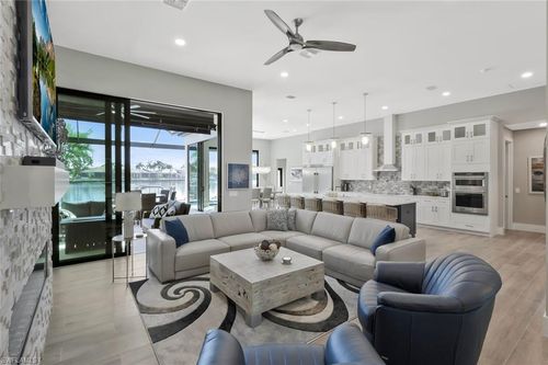 1812 Lagoon Ln, CAPE CORAL, FL, 33914-2509 | Card Image