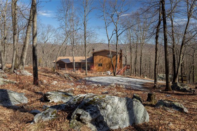 View of yard featuring a wooded view | Image 34