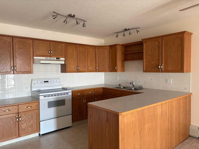 205 - 5600 Sunrise Crescent, Condo with 2 bedrooms, 1 bathrooms and 1 parking in Olds AB | Image 4