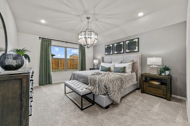 Bedroom featuring carpet flooring, a chandelier, baseboards, and recessed lighting | Image 16
