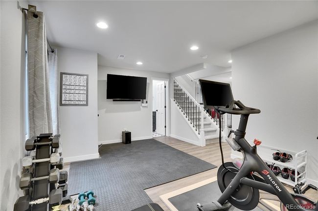 Excercise room in basement includes TV | Image 34