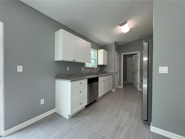 22911 Sw Nautilus Blvd, House other with 3 bedrooms, 2 bathrooms and null parking in DUNNELLON FL | Image 19