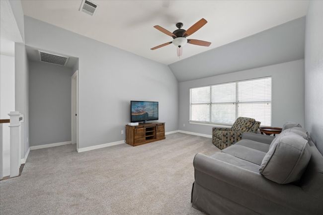 Upstairs game room - this is the second living space in this home. | Image 17