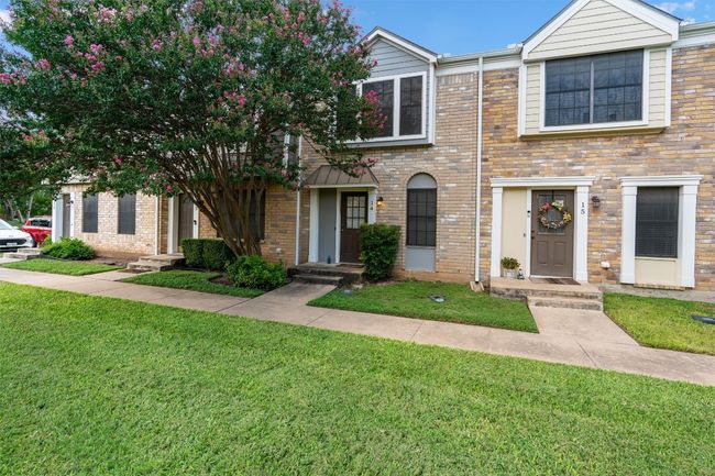 View of front of home with a front yard and brick siding | Image 7