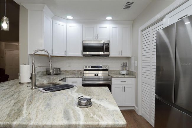 UNIT-202 - 8613 Mallard Reserve Dr, Condo with 2 bedrooms, 2 bathrooms and null parking in TAMPA FL | Image 4