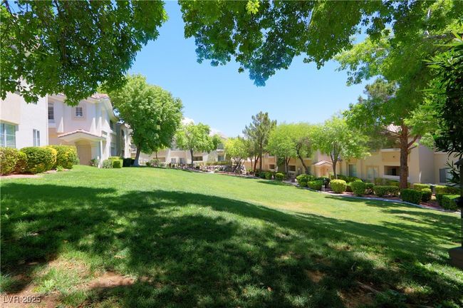 View of community with a residential view and a yard | Image 21