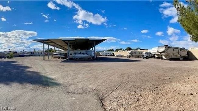 community has a huge covered and fenced area to park recreational vehicles. Additional fee charged for this service | Image 56