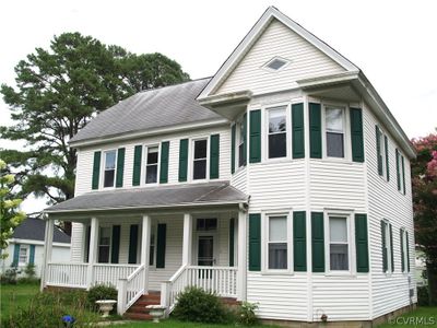 Classic bayfront farmhouse design. | Image 1