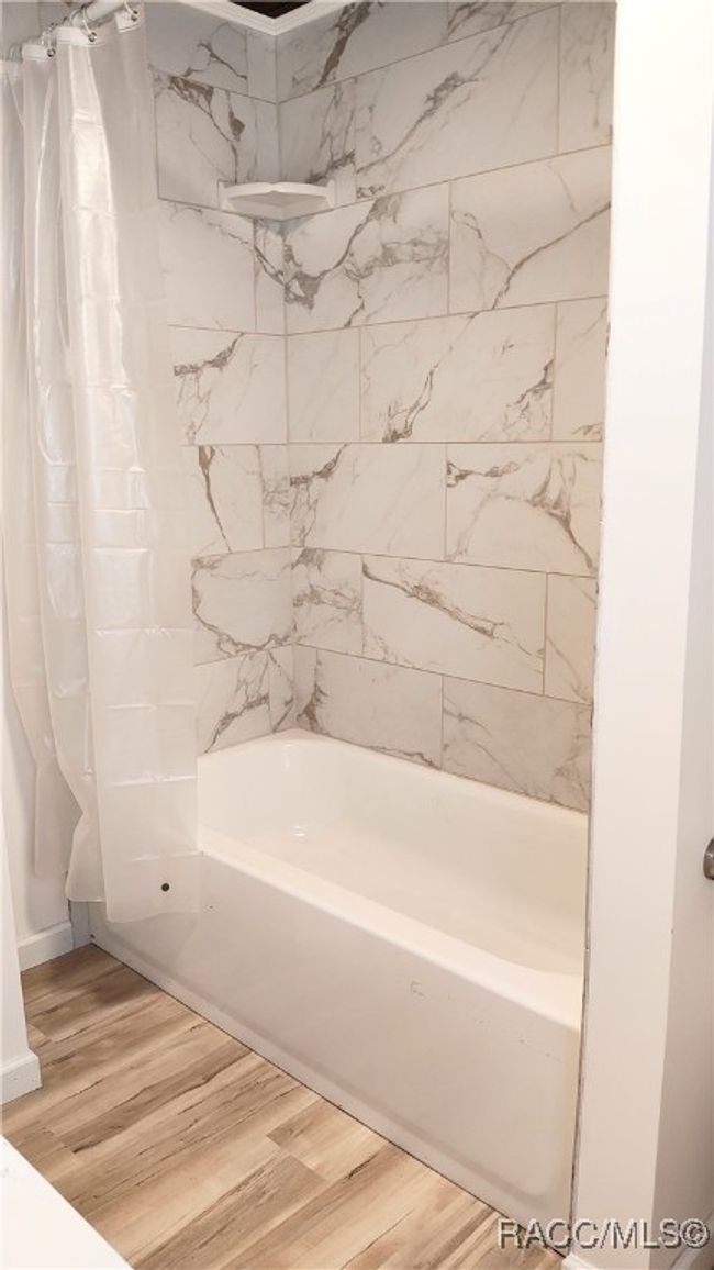2nd bath has tub shower combo | Image 24