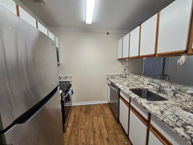 1205 University Commons Dr, Condo with 4 bedrooms, 4 bathrooms and 3 parking in Star City WV | Image 6