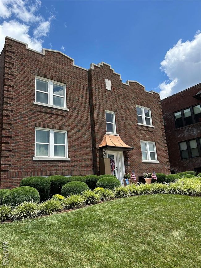 View of front of property with brick siding and a front yard | Image 4
