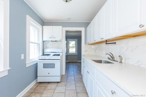 80 Kensington Ct, Copiague, NY, 11726-4310 | Card Image