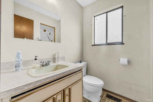 Bathroom with toilet and vanity | Image 18