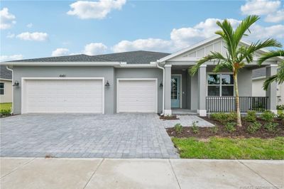 6481 Nw Cloverdale Avenue, House other with 3 bedrooms, 2 bathrooms and 3 parking in Port Saint Lucie FL | Image 1