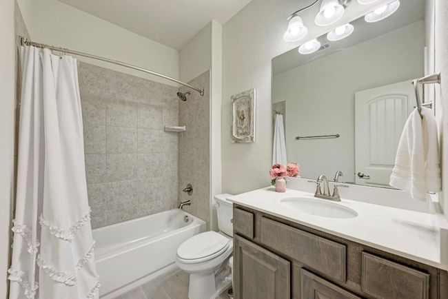 A third tiled, full bath is accessible to guests/family and secondary bedroom #3. | Image 35