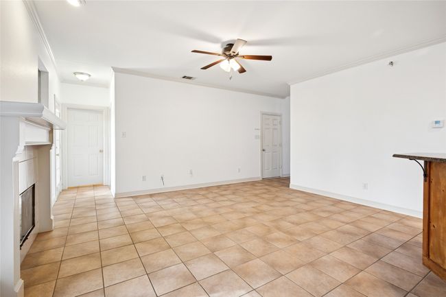 Family Room with view of door to utility room | Image 13