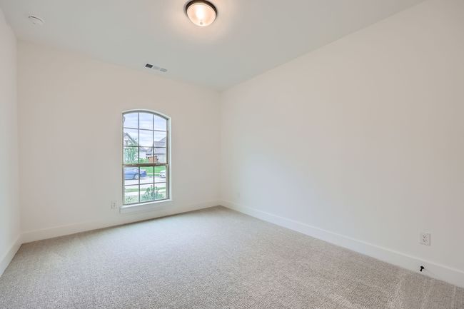 Unfurnished room with visible vents, baseboards, and light carpet | Image 18
