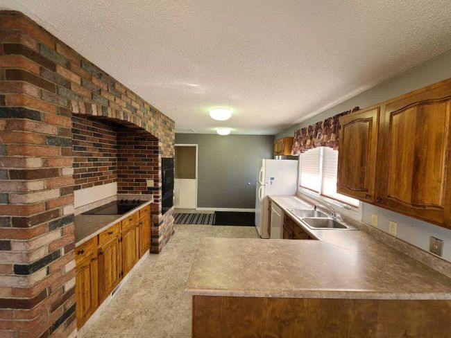 143 3 Avenue Se, Home with 3 bedrooms, 1 bathrooms and 5 parking in Falher AB | Image 14