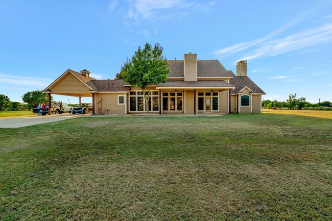 Dive into a HUGE POOL, plant a massive garden, play some soccer, baseball, or badminton on the lawn. | Image 5