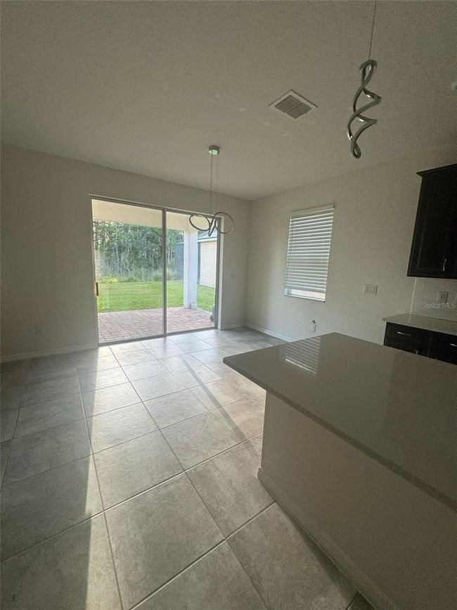 2440 Varenna Loop, House other with 3 bedrooms, 3 bathrooms and null parking in KISSIMMEE FL | Image 8