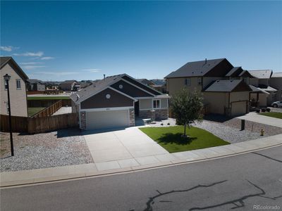 6551 Justice Way, House other with 4 bedrooms, 3 bathrooms and 2 parking in Colorado Springs CO | Image 3