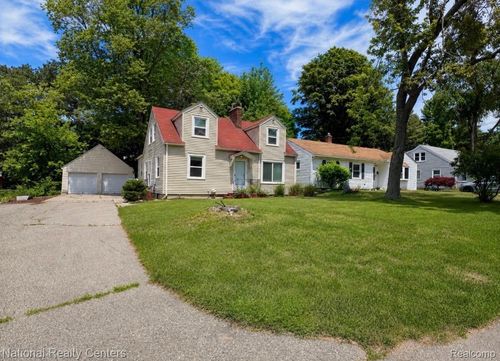 1142 Lilac Ave, East Lansing, MI, 48823-5123 | Card Image