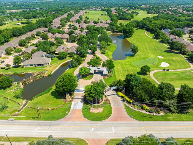 Aerial perspective of Heritage Ranch gated entrance and golf course. | Image 38