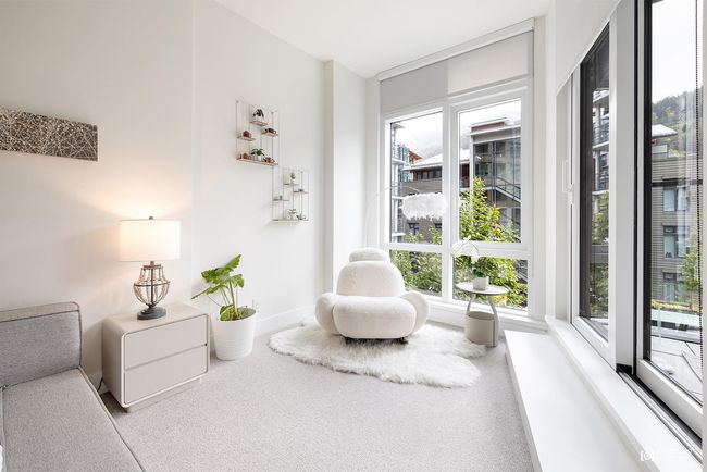 Living area with carpet flooring and baseboards | Image 13