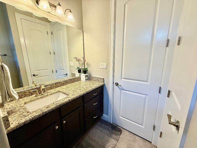 Bathroom with vanity and tile patterned flooring | Image 22