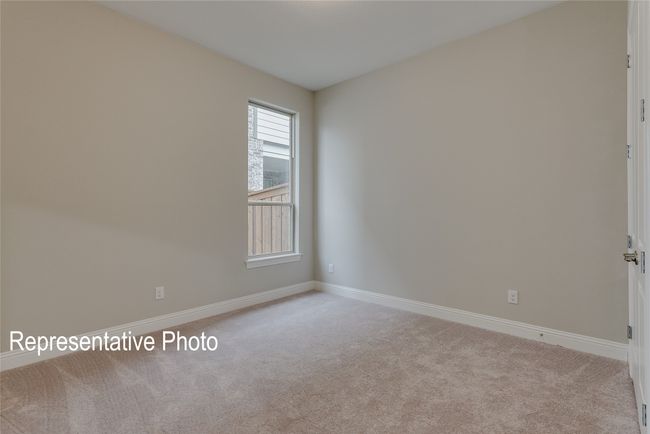 Empty room featuring carpet and baseboards | Image 13